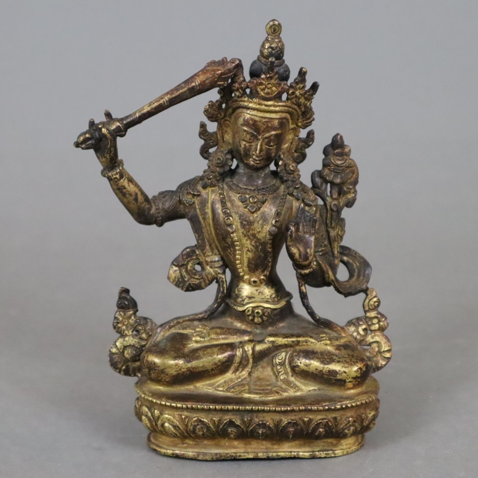 Bodhisattva Manjushri - Nepal, Gelbbronze, Reste von Vergoldung, der Bodhisattva der Weisheit in Va