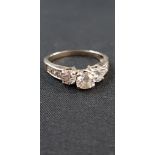 18 CARAT WHITE GOLD DIAMOND RING WITH CIRCA TOTAL 1.5 CARAT OF DIAMONDS. RING HAS BEEN RESIZED SO