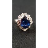 18CT WHITE GOLD SAPPHIRE AND DIAMOND RING