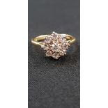 18 CARAT YELLOW GOLD DIAMOND RING WITH CIRCA 0.6 CARAT OF DIAMONDS