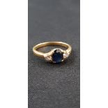 18 CARAT YELLOW GOLD SAPPHIRE & DIAMOND RING WITH CIRCA 0.15 CARAT OF DIAMONDS