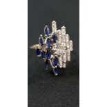 18 CARAT WHITE GOLD SAPPHIRE & DIAMOND RING - CENTRE STONE CIRCA 0.65 CARAT & REMAINING TOTAL 0.75