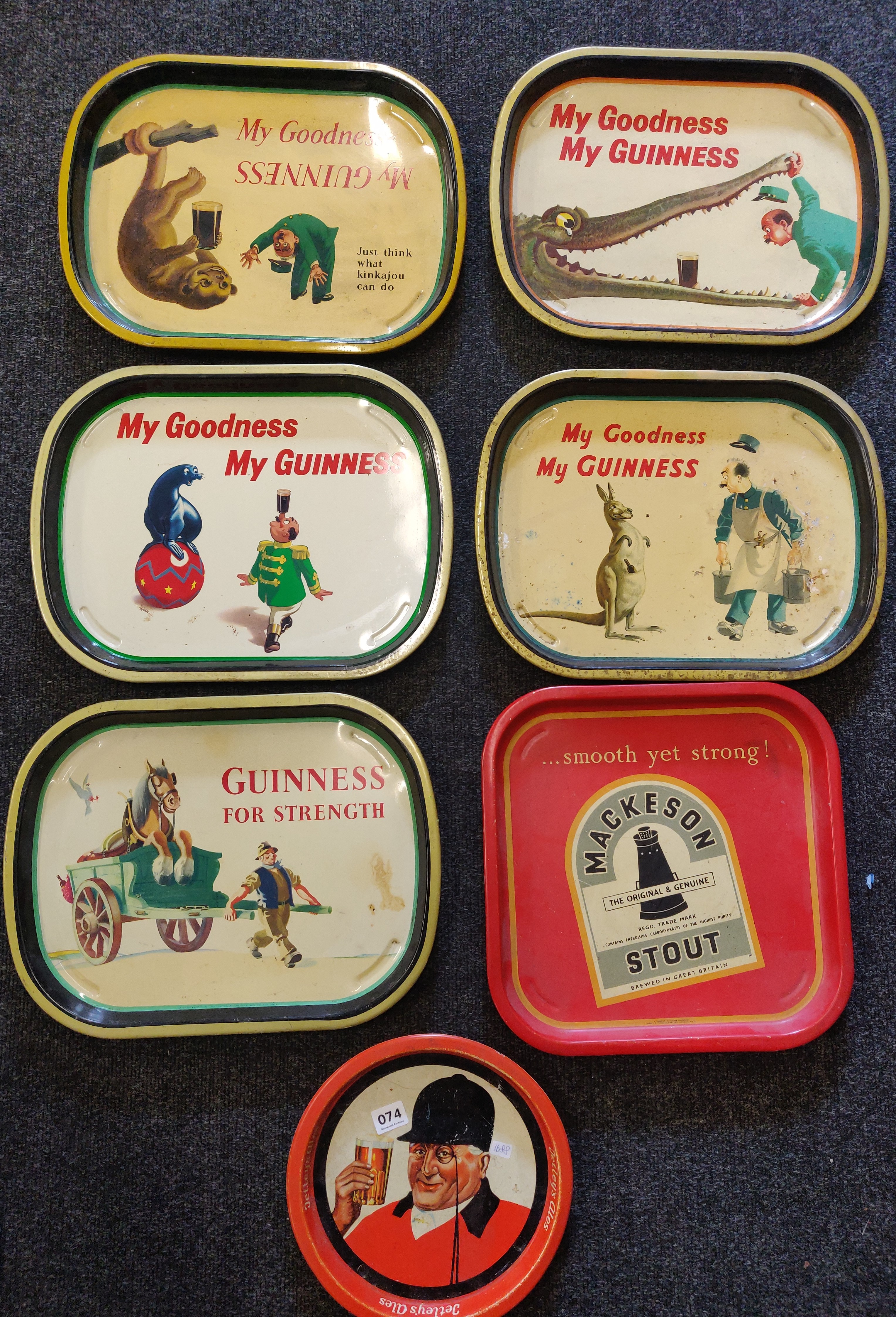 QUANTITY OF GUINNESS AND OTHE PUB TRAYS