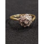 18CT GOLD AND DIAMOND DAISY HEAD RING 3 GRAMS