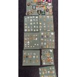 SHEETS OF MILITARY BADGES AND SHEET OF MILITARY PATCHES