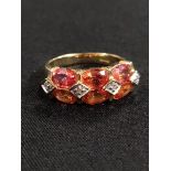 9 CARAT YELLOW GOLD ORANGE STONE & DIAMOND RING 4 GRAMS