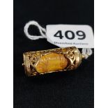 9CT GOLD OPEN WORK CANISTER CHARM WITH 10 SHILLING NOTE INSIDE CIRCA 7G