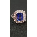 18CT WHITE GOLD DIAMOND AND TANZANITE RING 3 CARAT TANZANITE AND 0.75 CARAT OF DIAMONDS