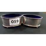 PAIR OF ANTIQUE SILVER SALTS WITH BLUE LINERS