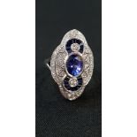 18CT WHITE GOLD DIAMOND, SAPPHIRE AND TANZANITE RING 1.5 CARAT TANZANITE, 1 CARAT DIAMOND