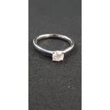 18CT WHITE GOLD DIAMOND RING WITH OVER A HALF CARAT SOLITAIRE