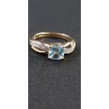 9CT GOLD DIAMOND AND BLUE TOPAZ RING