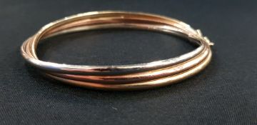 9CT 3 TONE GOLD BANGLE CIRCA 9.4 GRAMS