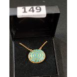 9CT GOLD TORQUIOSE PENDANT ON 9CT GOLD CHAIN (STONES MISSING)