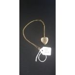 GOLD FRONT & BACK LOCKET ON 9 CARAT GOLD CHAIN