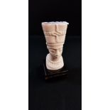IVORY CARVING OF A PHAROAH ON WOODEN BASE
