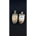 STUNNING AND RARE PAIR OF CHINESE SNUFF BOTTLES ENGRAVED AND ETCHED IVORY WITH WHITE METAL