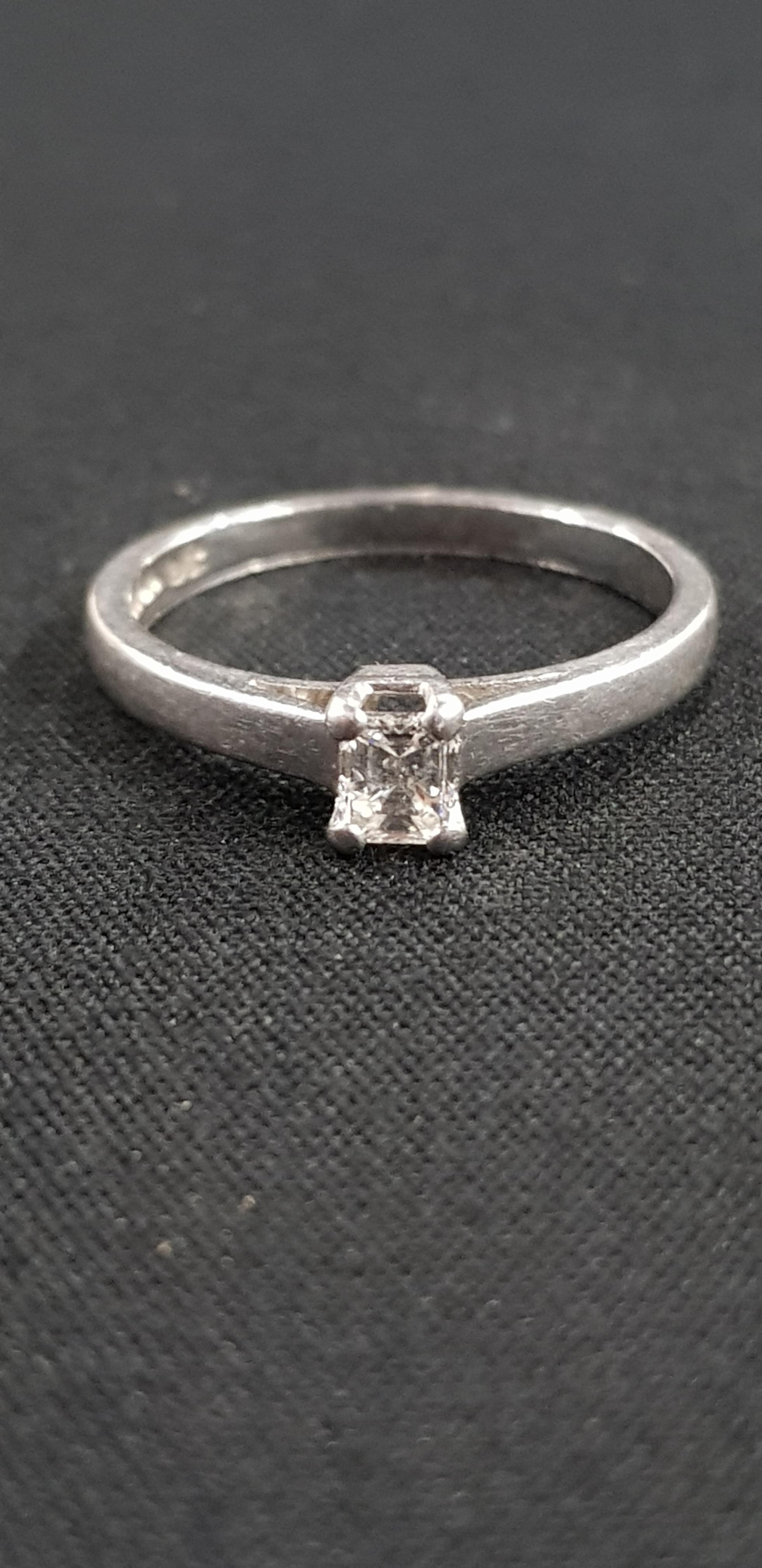 PLATINUM AND DIAMOND SOLITAIRE RING