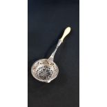 FRENCH SOLID SILVER CASTER SPOON WITH IVORY HANDLE CIRCA 1910-1930