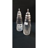 PAIR OF FACETTED GLASS CRUETS WITH SILVER TOPS LONDON 1913