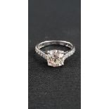 18CT GOLD DIAMOND SOLITAIRE RING 2.32 CARATS WITH 1 CARAT OF DIAMONDS IN THE BAND. COLOUR J, CLARITY