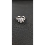 18CT WHITE GOLD AND DIAMOND CLUSTER RING WITH HALF CARAT OF DIAMONDS