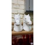 PAIR OF CERAMIC HORSE HEADS