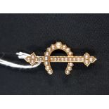 GOLD BROOCH SET WITH SPLIT PEARLS - GOLD NOT HALLMARKED BUT HAS BEEN TESTED