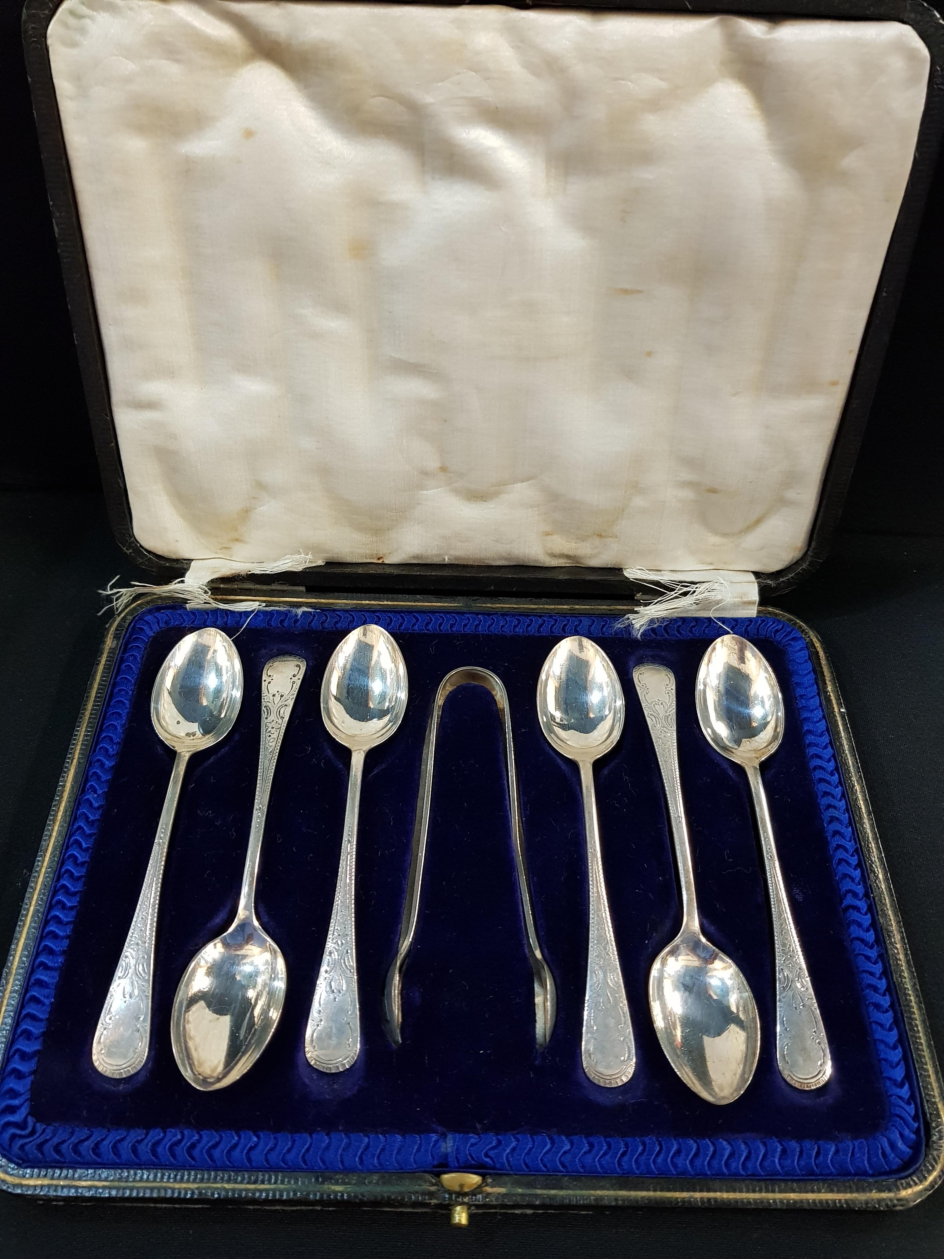 SET OF SILVER TEASPOONS