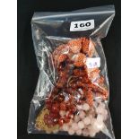 BAG OF GOOD QUALITY ANTIQUE COSTUME JEWELLERY TO INCLUDE CORAL AND GENUINE AMBER