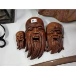 3 WOODEN CARVED DAO FACES