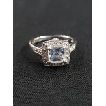 9CT WHITE GOLD DIAMOND AND AQUAMARINE RING SIZE J