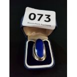 LARGE SILVER AND BLUE STONE RING