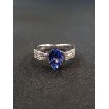 18 CARAT WHITE GOLD & DIAMOND TANZANITE RING