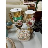 2 PORCELAIN URNS AND TEA CADDY