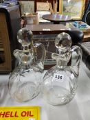 MATCHING PAIR OF CUT GLASS DECANTERS