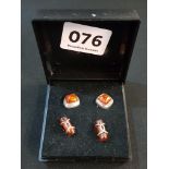 2 PAIRS OF SILVER AND AMBER EARRINGS