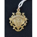 9 CARAT GOLD FOOTBALL MEDAL - 'PRESENTED TO J CROOKS BY L.F.C. 1906-7'