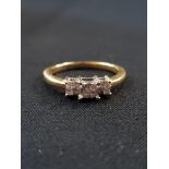 18CT GOLD AND DIAMOND RING WITH CIRCA 0.25 CARAT OF DIAMONDS