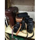 2 PAIRS OF BINOCULARS