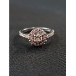 PLATINUM AND DIAMOND RING WITH 0.58 CARAT OF DIAMONDS (ACCOMPANIED WITH INSURANCE VALUATION AT £