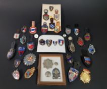 LARGE QUANTITY OF ANTIQUE AND VINTAGE EUROPEAN POLICE BADGES