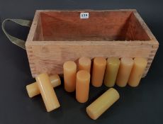 MILITARY WOODEN AMMUNITION CRATE WITH 10 X 1960/70'S PLASTIC BATON ROUNDS