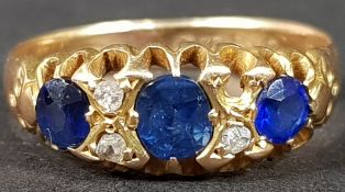 18CT GOLD DIAMOND AND SAPPHIRE RING (STONE MISSING) 3.7G