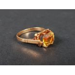 CONTINENTAL 9CT GOLD AND ORANGE STONE RING 3.2G