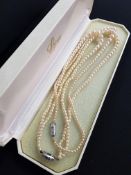 2 PEARL NECKLACES IN BOX - ONE WITH SILVER CLASP