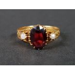 VICTORIAN 18CT TESTS TO GARNET AND PEARL RING 1.7G