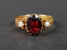 VICTORIAN 18CT TESTS TO GARNET AND PEARL RING 1.7G