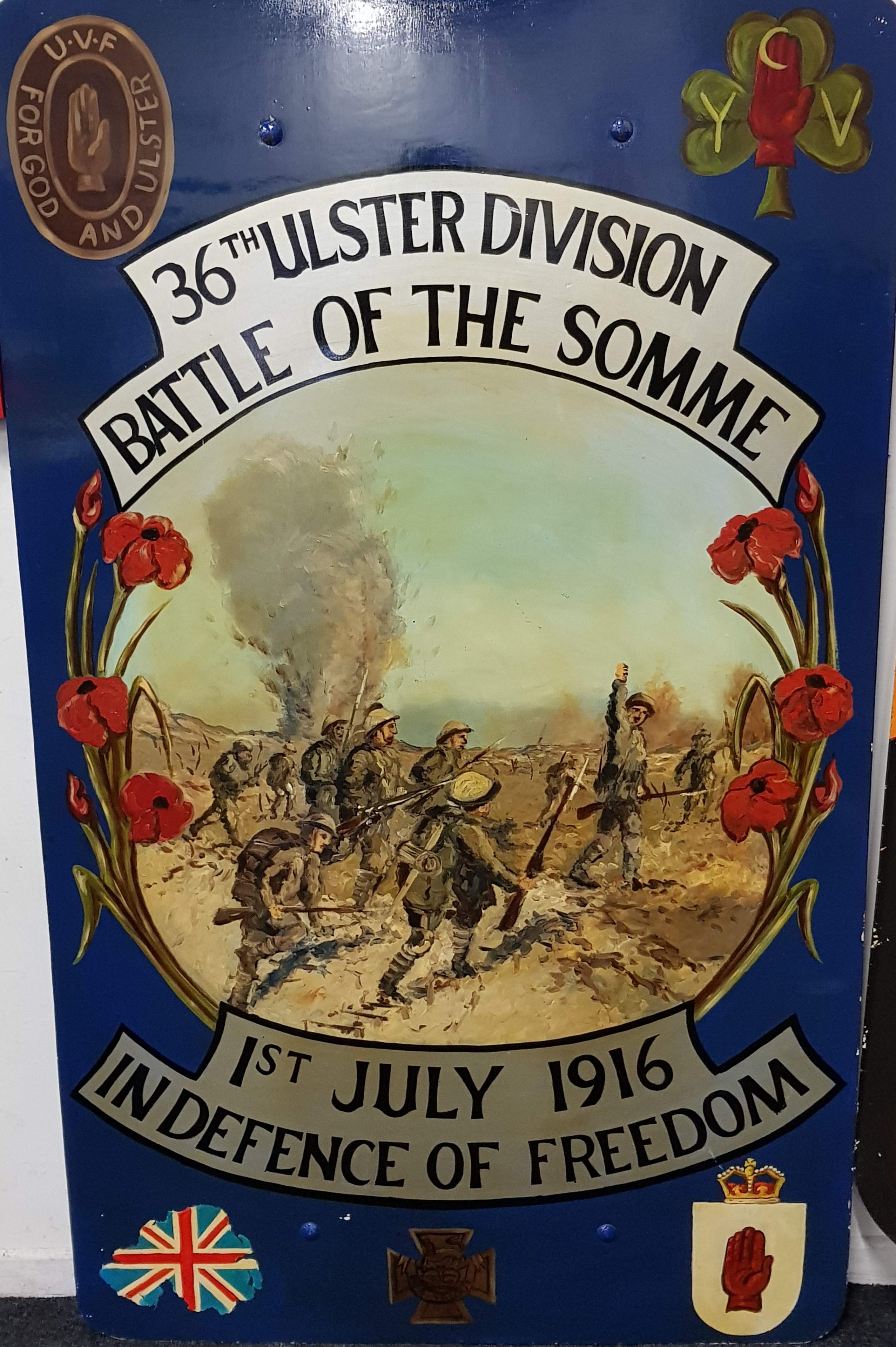 LARGE HAND PAINTED 36TH ULSTER DIVISION WOODEN PLAQUE DEPICTING THE ATTACK ON THE 1ST OF JULY 1916