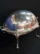 HEAVY 2360 GRAMS STERLING SILVER REVOLVING BREAKFAST DISH WITH SCROLL FEET. LONDON 1911. C&S CO LTD